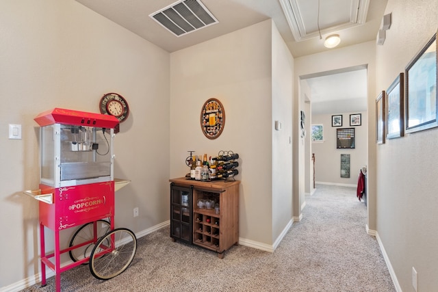 hallway with carpet