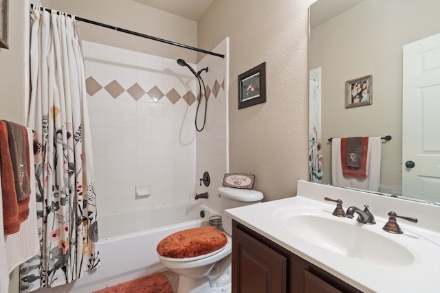 full bathroom with shower / tub combo with curtain, vanity, and toilet