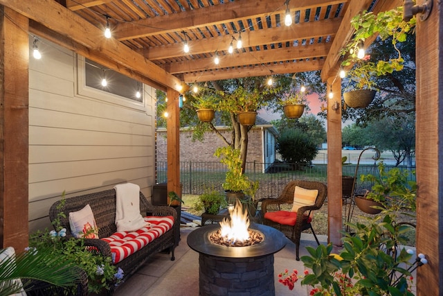 view of patio featuring a fire pit and a pergola