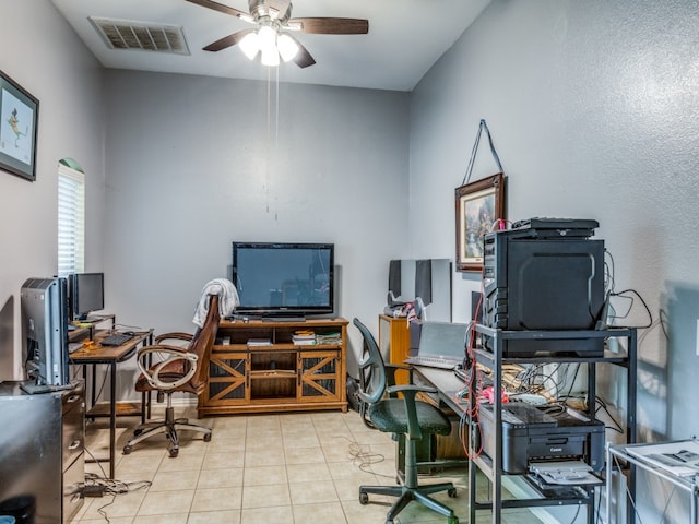 tiled office space with ceiling fan