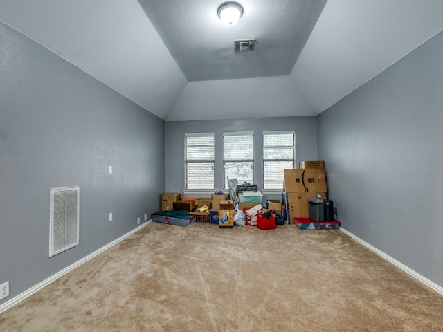 rec room with lofted ceiling and carpet floors