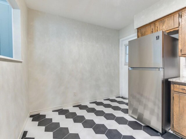 kitchen with stainless steel fridge