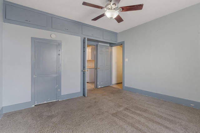 unfurnished bedroom featuring light carpet and ceiling fan