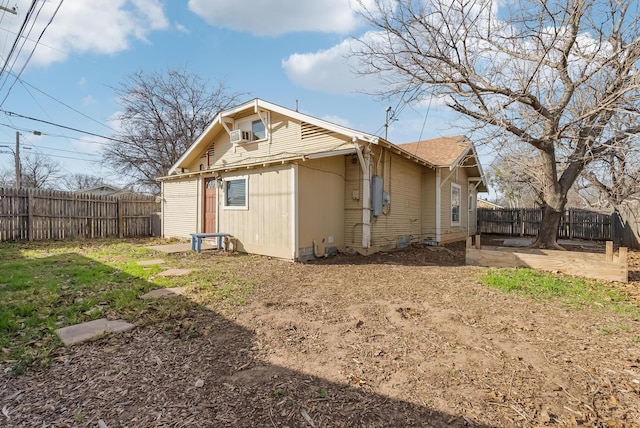 rear view of house featuring a patio