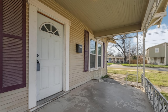 doorway to property with a porch