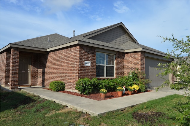 view of front of property featuring a garage