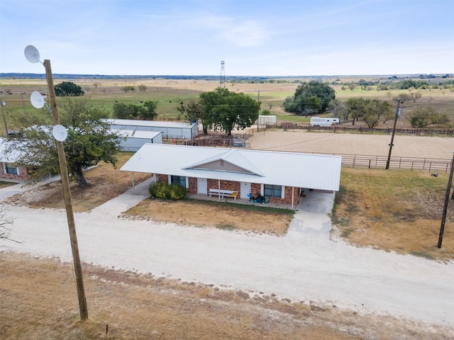 birds eye view of property featuring a rural view