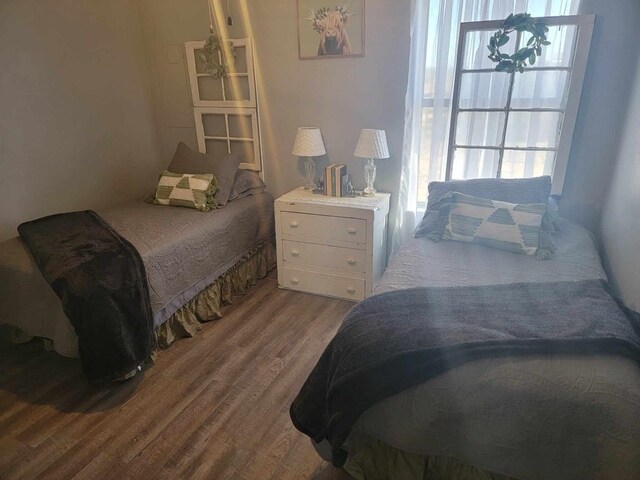 bedroom featuring hardwood / wood-style flooring