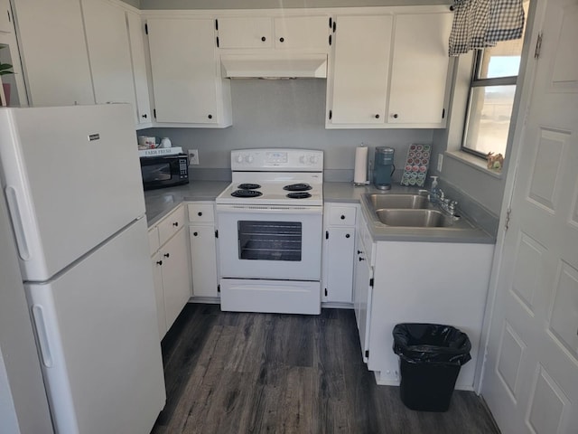 kitchen with custom exhaust hood, white appliances, dark hardwood / wood-style flooring, sink, and white cabinets