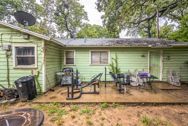 rear view of house with a patio