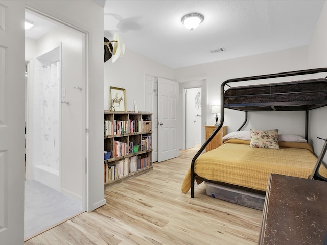 bedroom featuring light hardwood / wood-style flooring