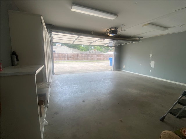 garage featuring a garage door opener