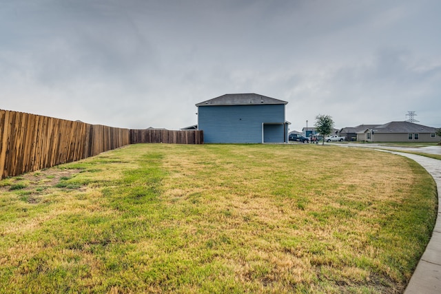 view of yard with a garage