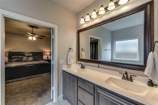 bathroom featuring vanity and ceiling fan