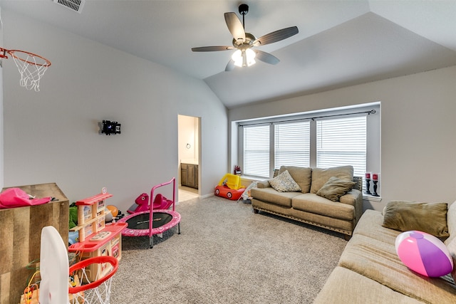 playroom featuring lofted ceiling, carpet, and ceiling fan