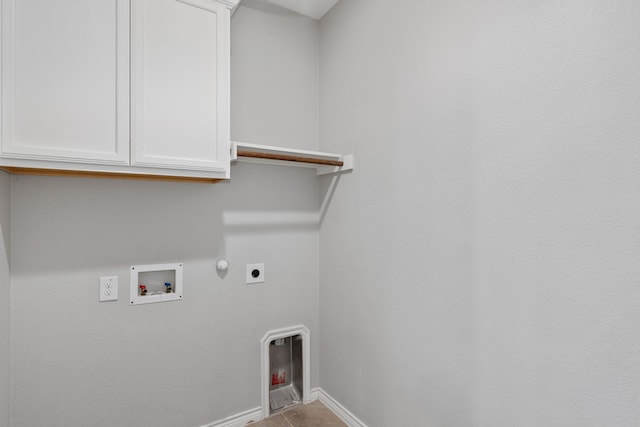 laundry area with hookup for a washing machine, cabinets, hookup for a gas dryer, and hookup for an electric dryer