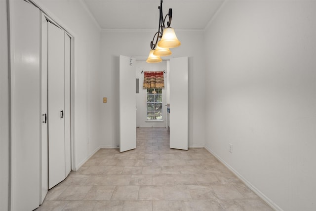 unfurnished dining area with ornamental molding