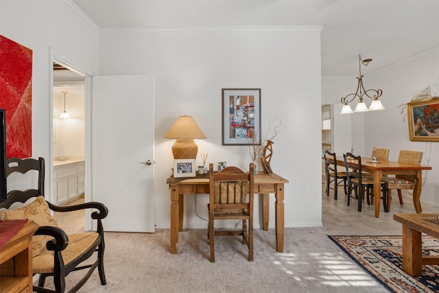 sitting room featuring a notable chandelier, light colored carpet, and crown molding