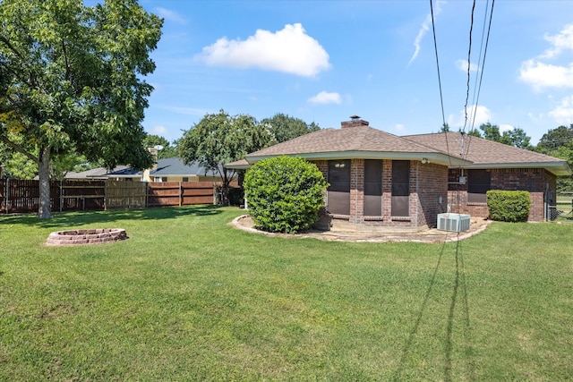 view of yard with an outdoor fire pit