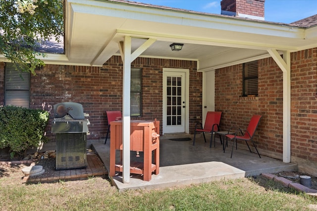 view of patio with a grill