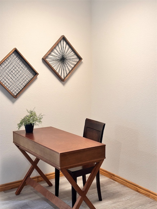 dining room with hardwood / wood-style floors