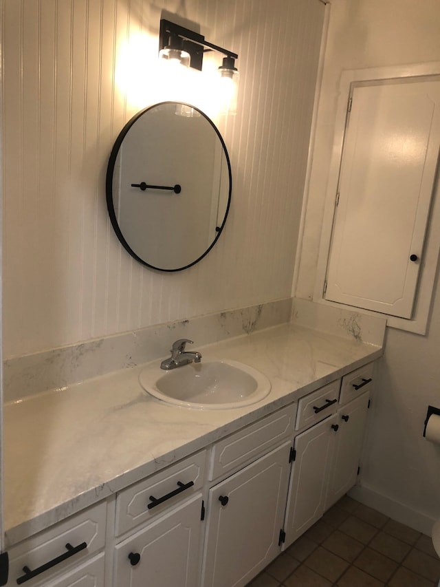 bathroom featuring tile patterned floors and vanity