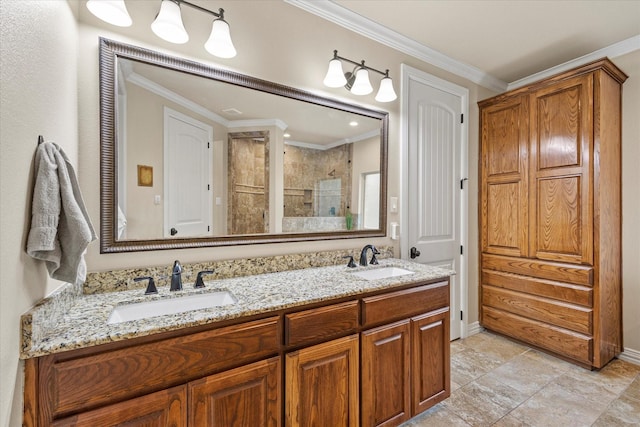 full bath with double vanity, a stall shower, a sink, and crown molding