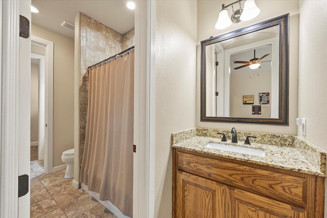 bathroom featuring visible vents, toilet, ceiling fan, curtained shower, and vanity