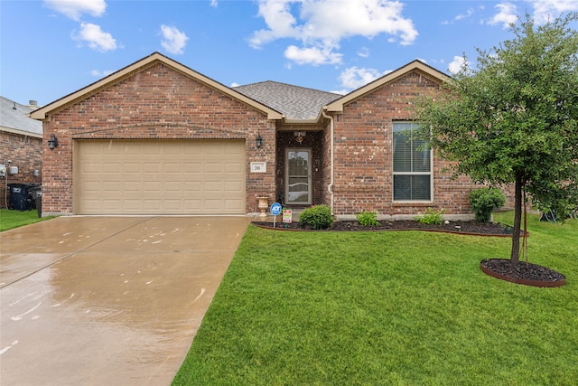 view of front of house with a garage and a front yard