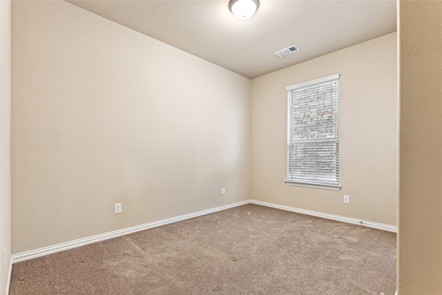 view of carpeted spare room