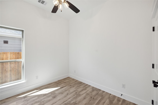 spare room featuring ceiling fan and light hardwood / wood-style floors