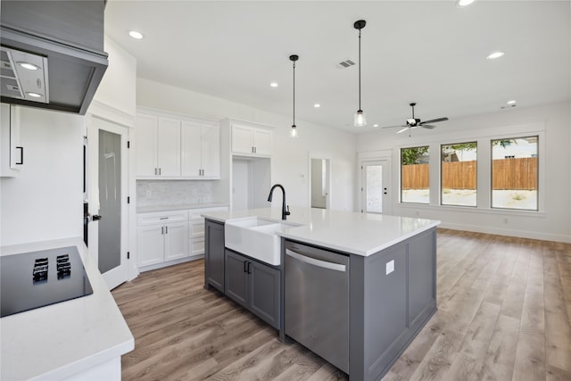 kitchen with dishwasher, ceiling fan, light hardwood / wood-style flooring, and white cabinets