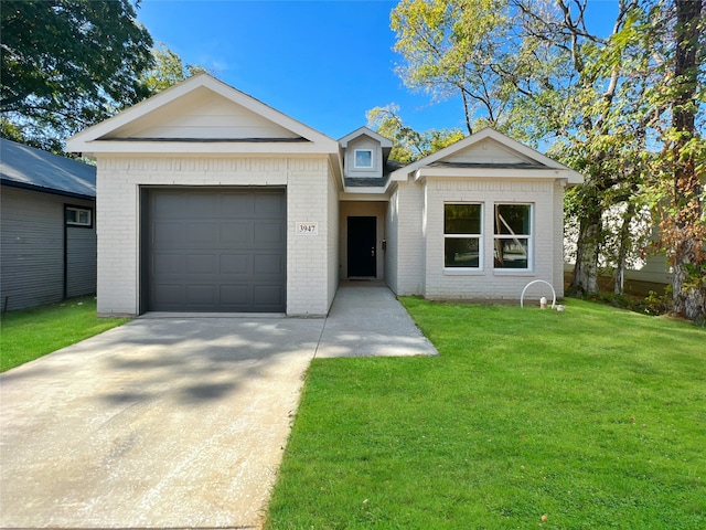 ranch-style home with a garage and a front lawn