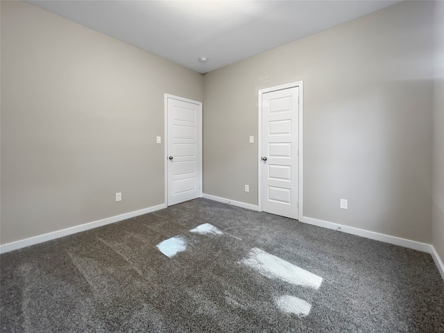 empty room featuring carpet floors