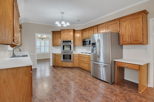 kitchen with a notable chandelier, appliances with stainless steel finishes, hanging light fixtures, ornamental molding, and sink