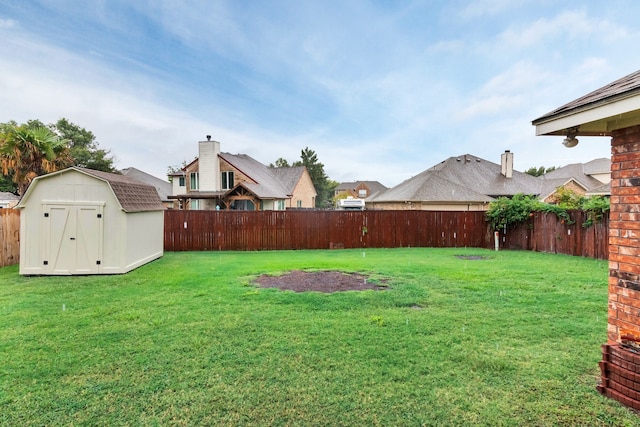 view of yard featuring a storage unit