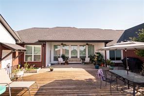 wooden deck featuring outdoor dining space