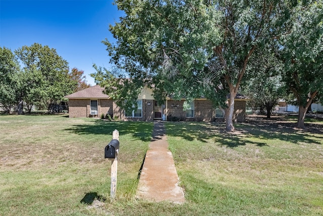 view of front facade with a front lawn