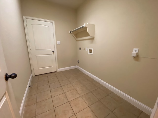 laundry area featuring light tile patterned floors, gas dryer hookup, electric dryer hookup, and washer hookup