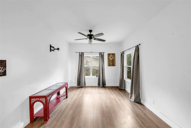 interior space featuring ceiling fan and light wood-type flooring