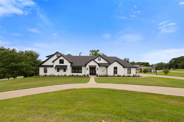 view of front facade with a front lawn