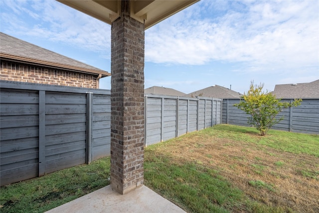 view of yard featuring a fenced backyard