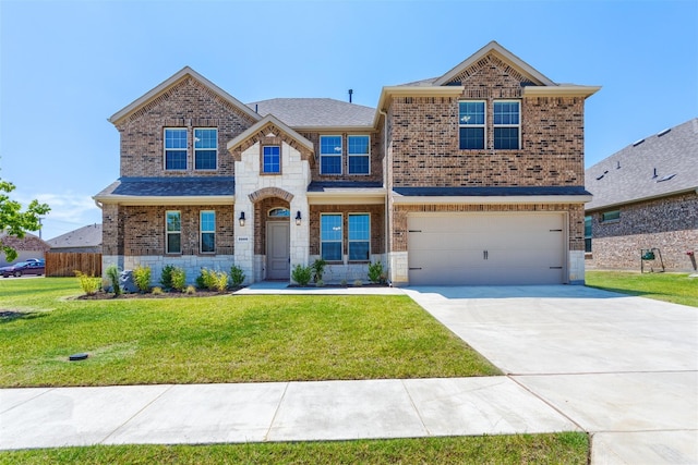 view of front of house featuring a garage and a front yard