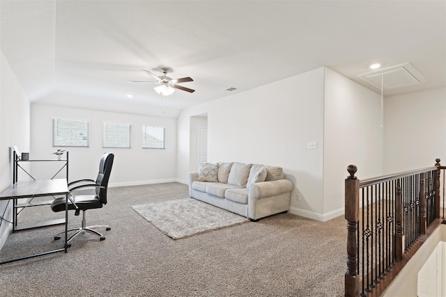 carpeted office with ceiling fan