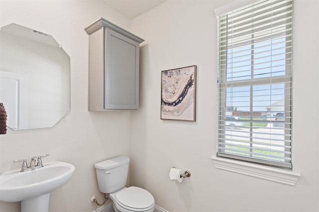 bathroom with toilet and sink