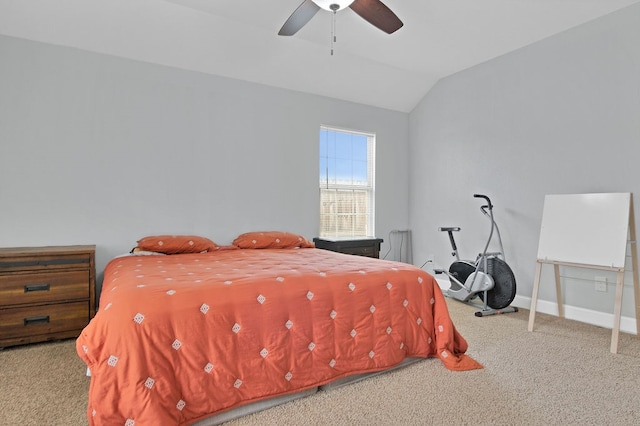 bedroom featuring ceiling fan, light colored carpet, and vaulted ceiling