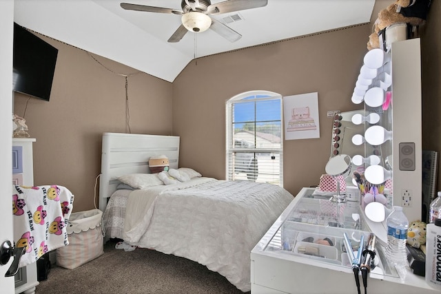 bedroom featuring lofted ceiling, carpet flooring, and ceiling fan