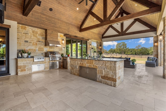 view of patio / terrace featuring grilling area, area for grilling, ceiling fan, and a gazebo