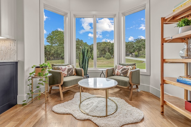 sitting room with light hardwood / wood-style floors