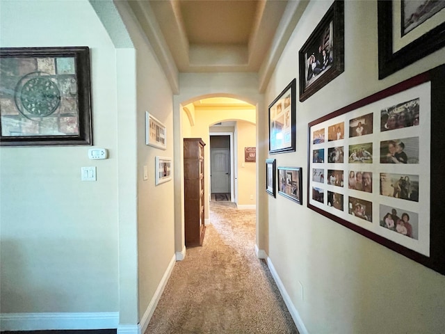 hallway featuring carpet flooring